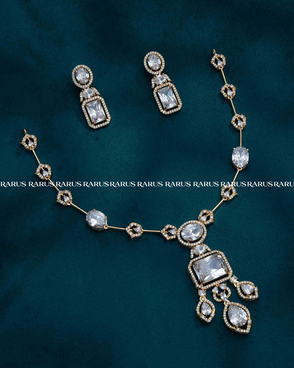 White AD stone chain necklace set with emerald-cut pendant, cluster drop and matching earrings, RARUS Jewels