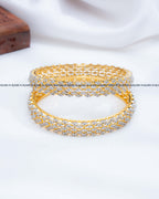 AD stone diamond look wide gold bangles set of 2 with clear stone clusters, RARUS Jewels