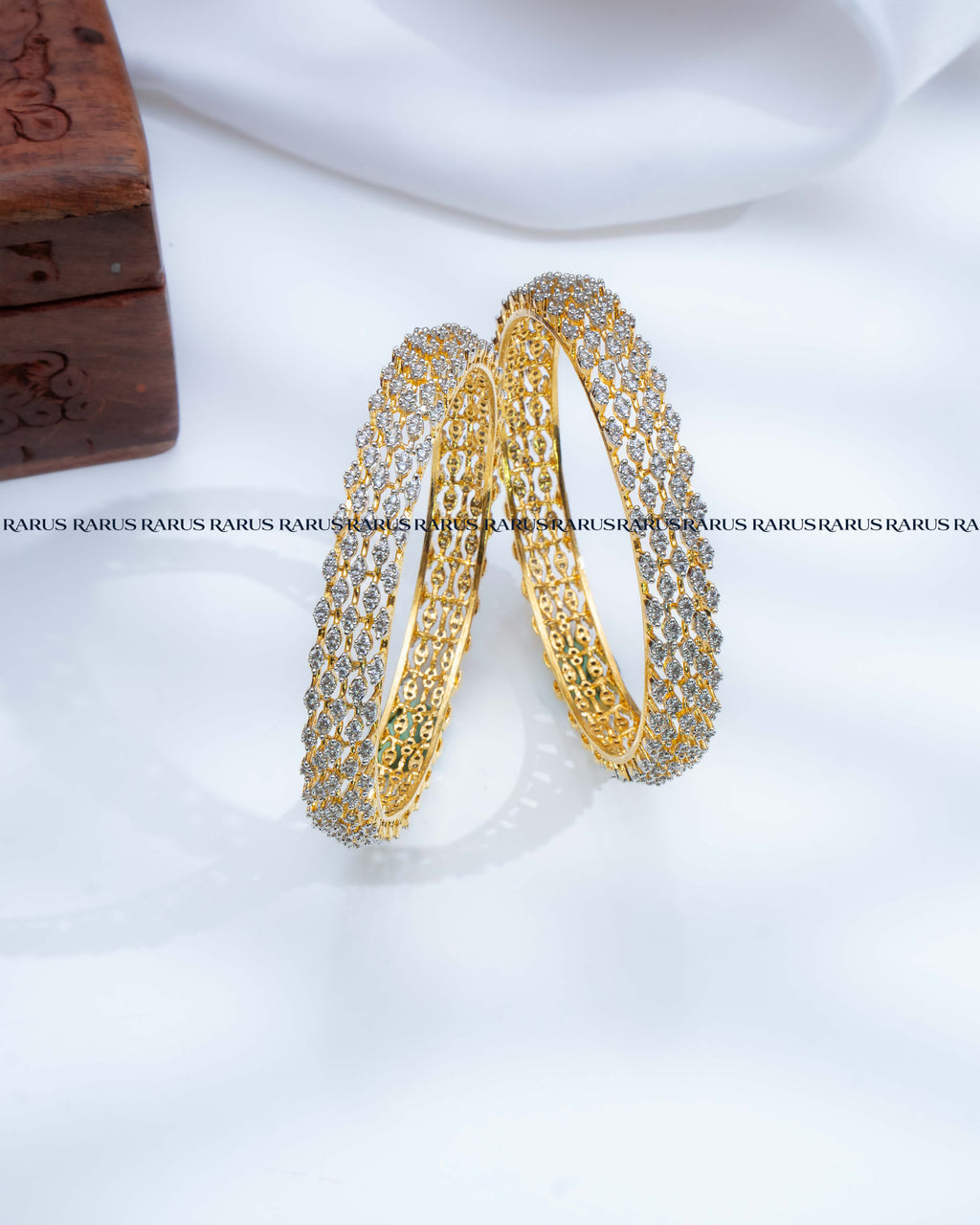 AD stone diamond look wide gold bangles set of 2 with clear stone clusters, RARUS Jewels