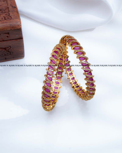 Red oval stone spiral design AD stone gold bangles set of 2, RARUS Jewels
