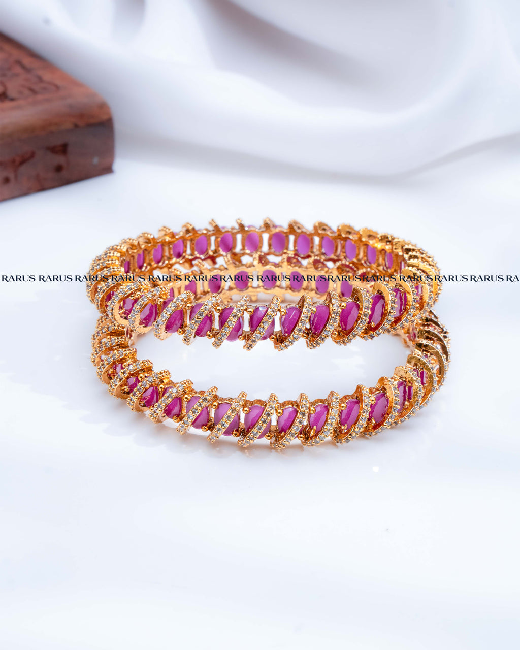 Red oval stone spiral design AD stone gold bangles set of 2, RARUS Jewels