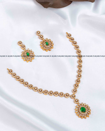 Emerald green AD stone sunburst medallion necklace set with stone-set chain and matching drop earrings, RARUS Jewels