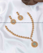 Mint green AD stone sunburst medallion necklace set with stone-set chain and matching drop earrings, RARUS Jewels