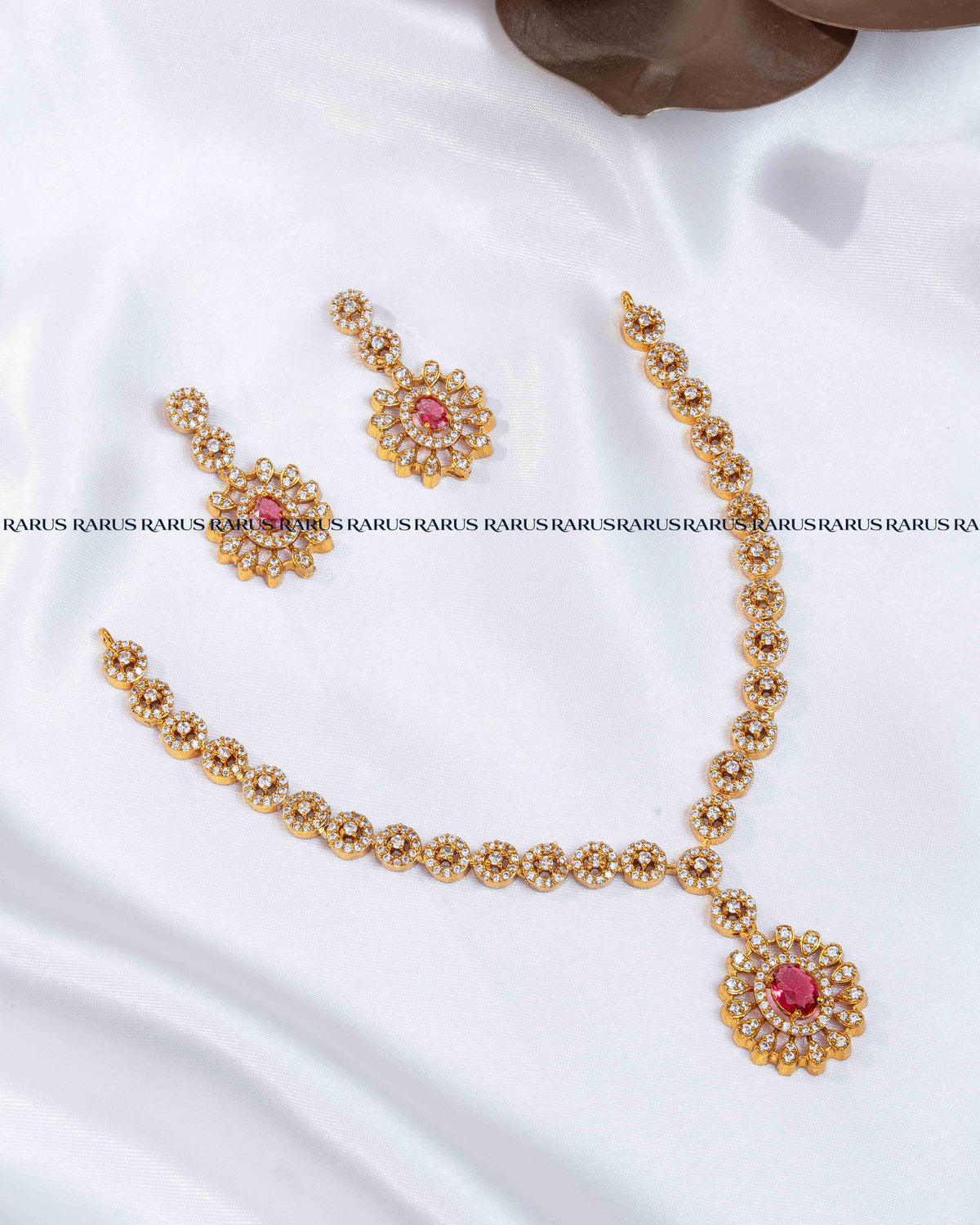 Ruby red AD stone sunburst medallion necklace set with stone-set chain and matching drop earrings, RARUS Jewels