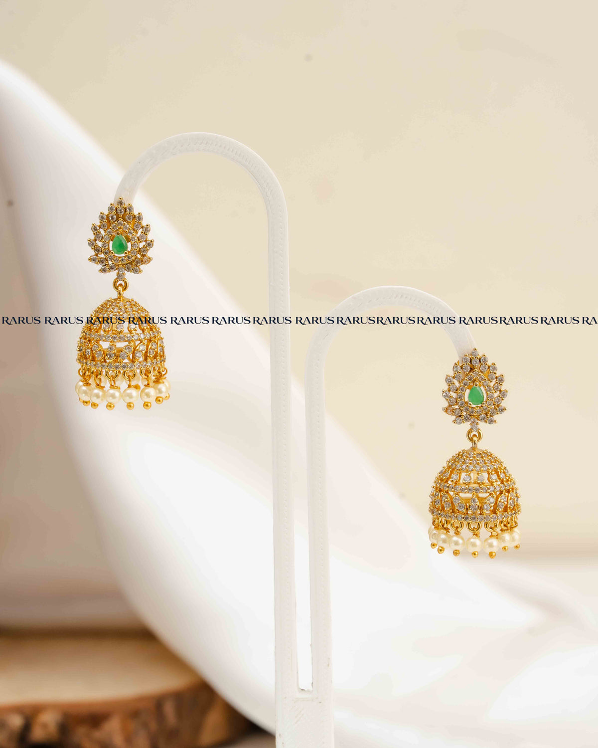 AD Stone Jhumka Earrings with Pearl Drops – Green