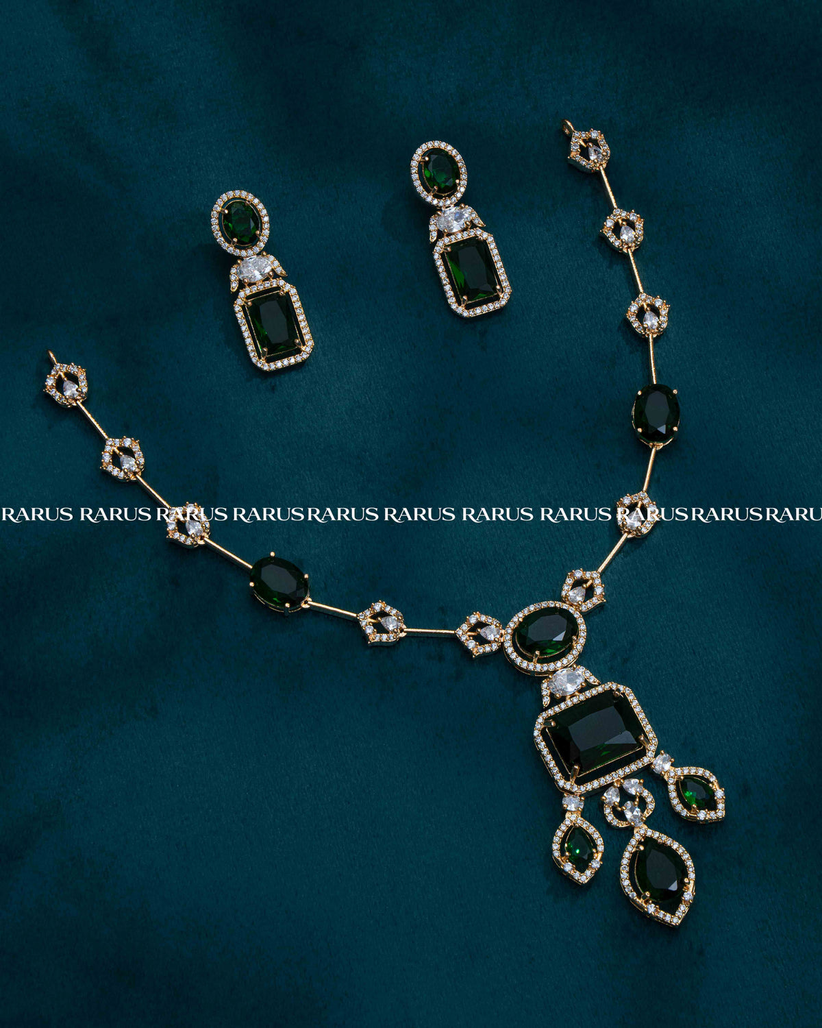 Premium chain pendant set with emerald-cut stone centerpiece & matching earrings. 6 colors available. Everyday glam, imitation jewellery price.